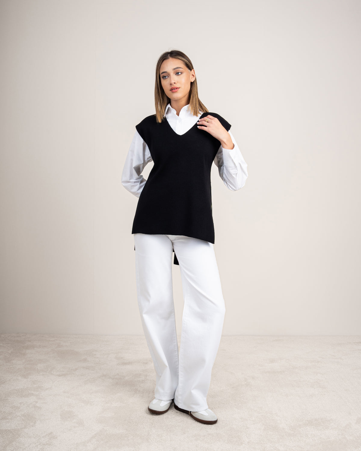 Knit vest with a tie-back detail