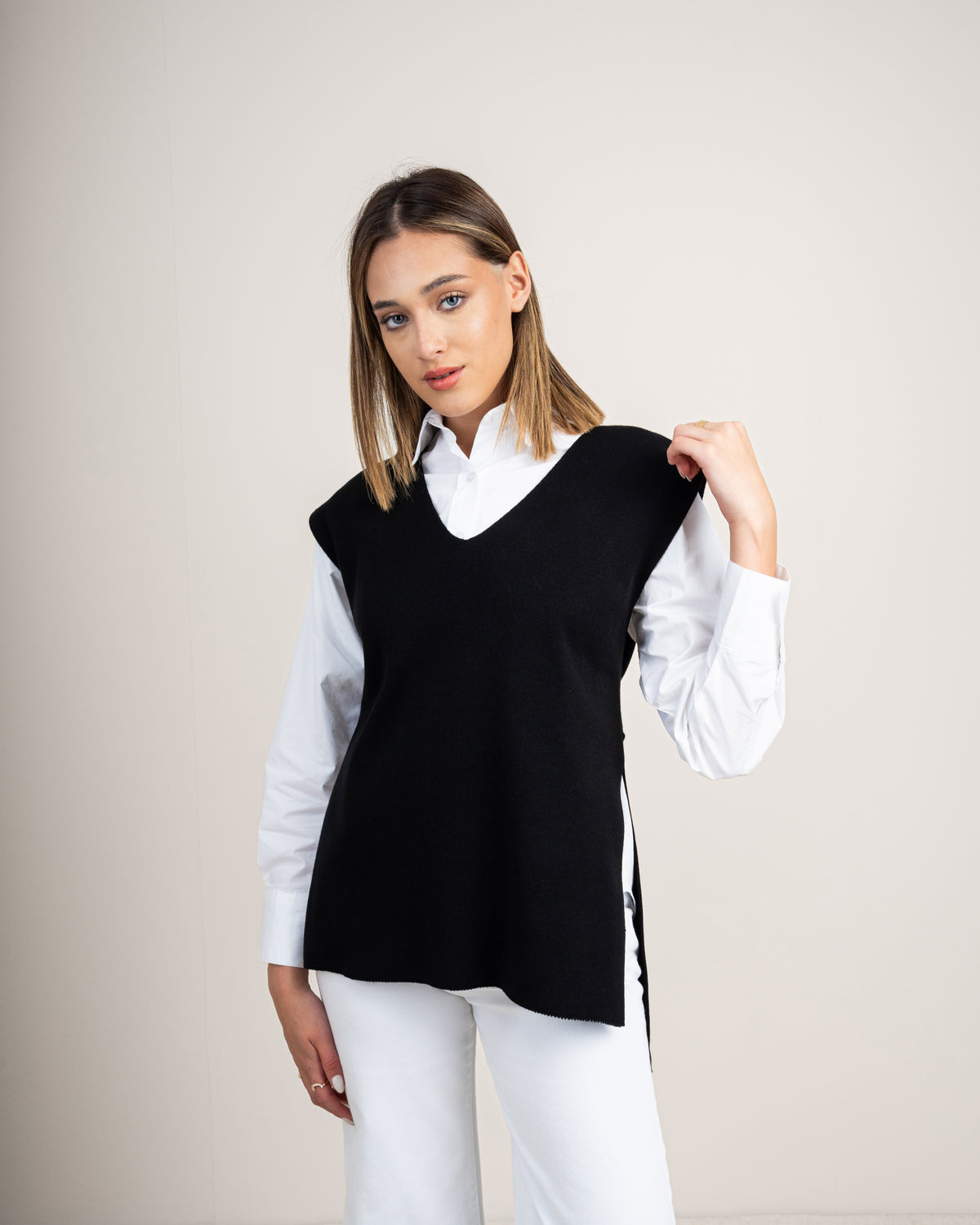 Knit vest with a tie-back detail