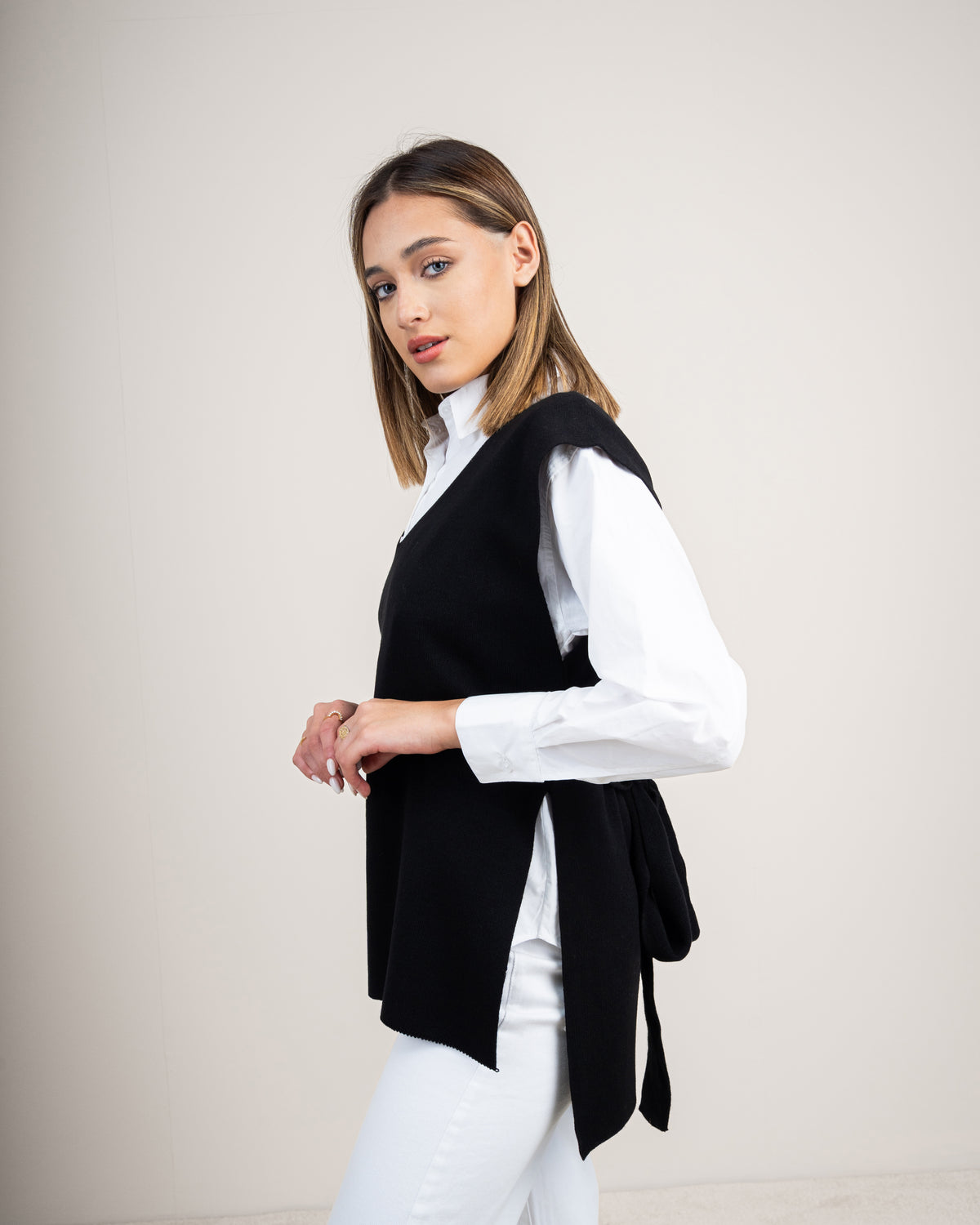 Knit vest with a tie-back detail