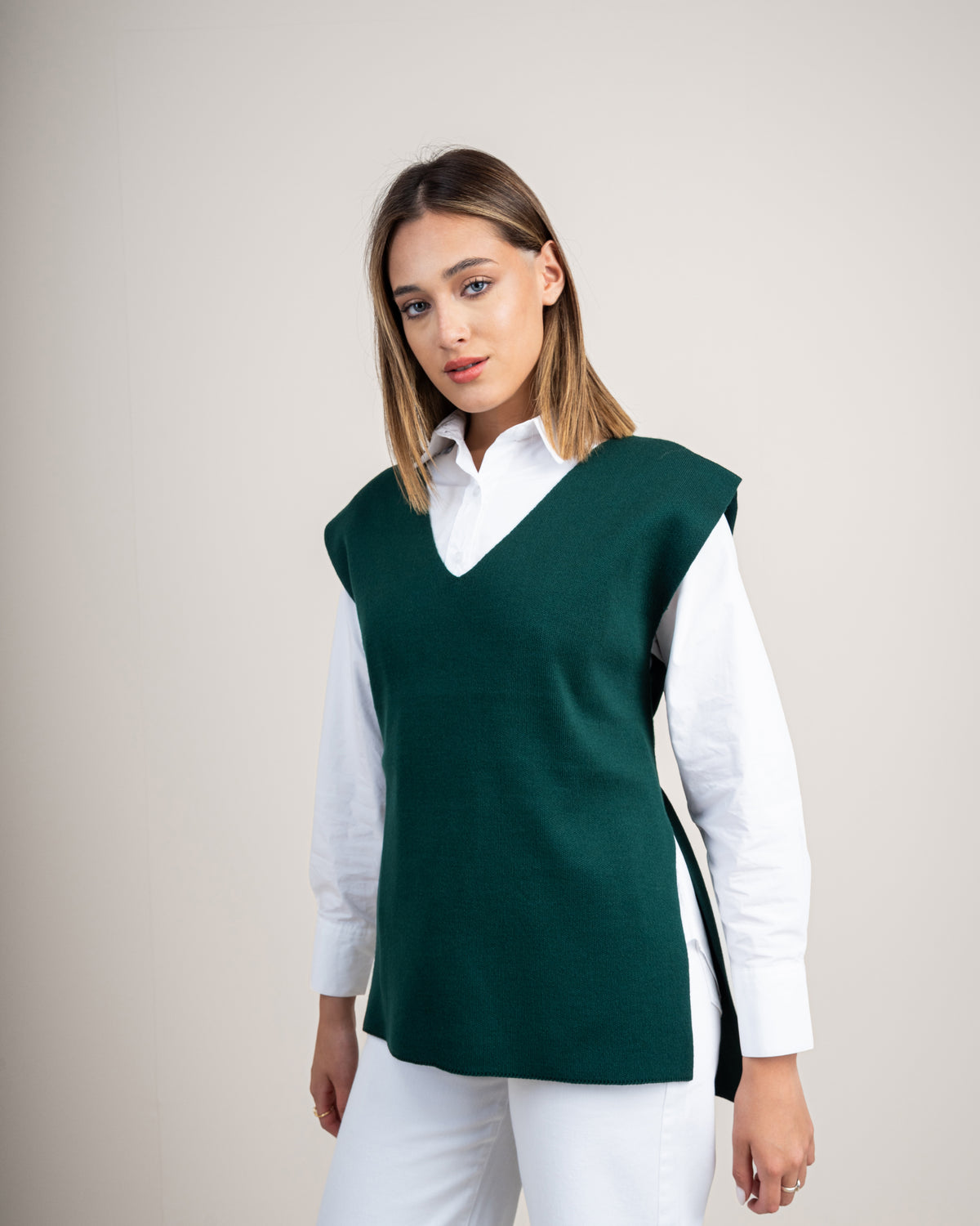 Knit vest with a tie-back detail