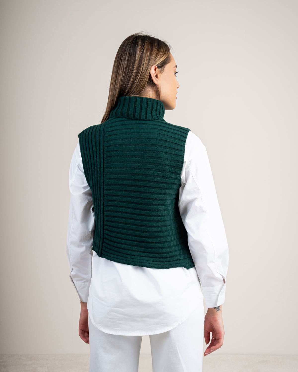 Knitted vest with a neckline